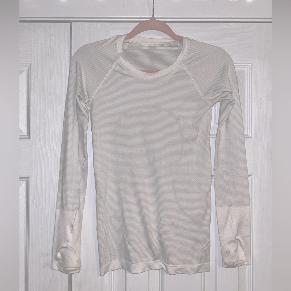 Size 4 lululemon long sleeve white shirt!!